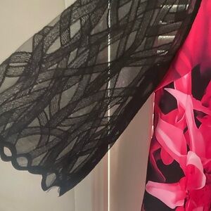 Nice black dress with lace sleeves. Size 3x